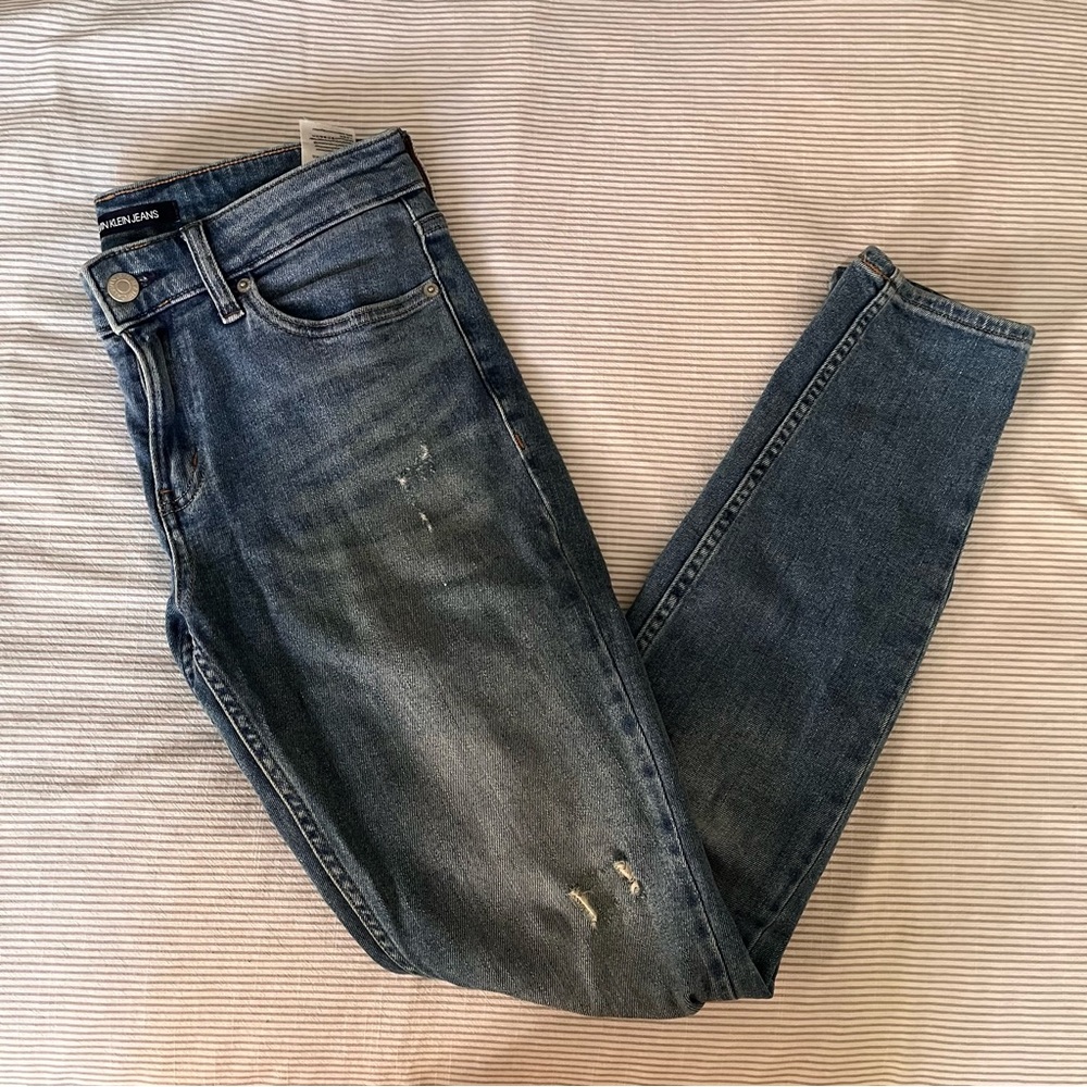 Calvin Klein distressed light wash skinny jeans